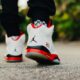 Image of a person walking with air jordans