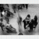 Blurred crowd walking in busy indoor space